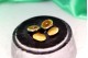 Botões de punho em ouro bicolor em formato de botão e diamantes 